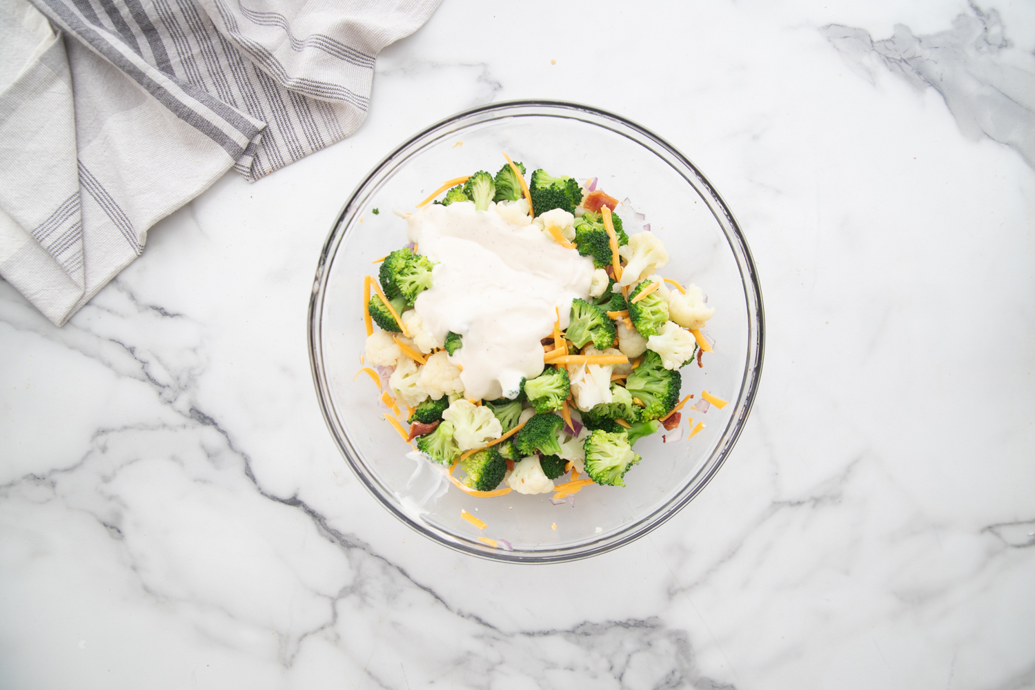 dressing added to bowl