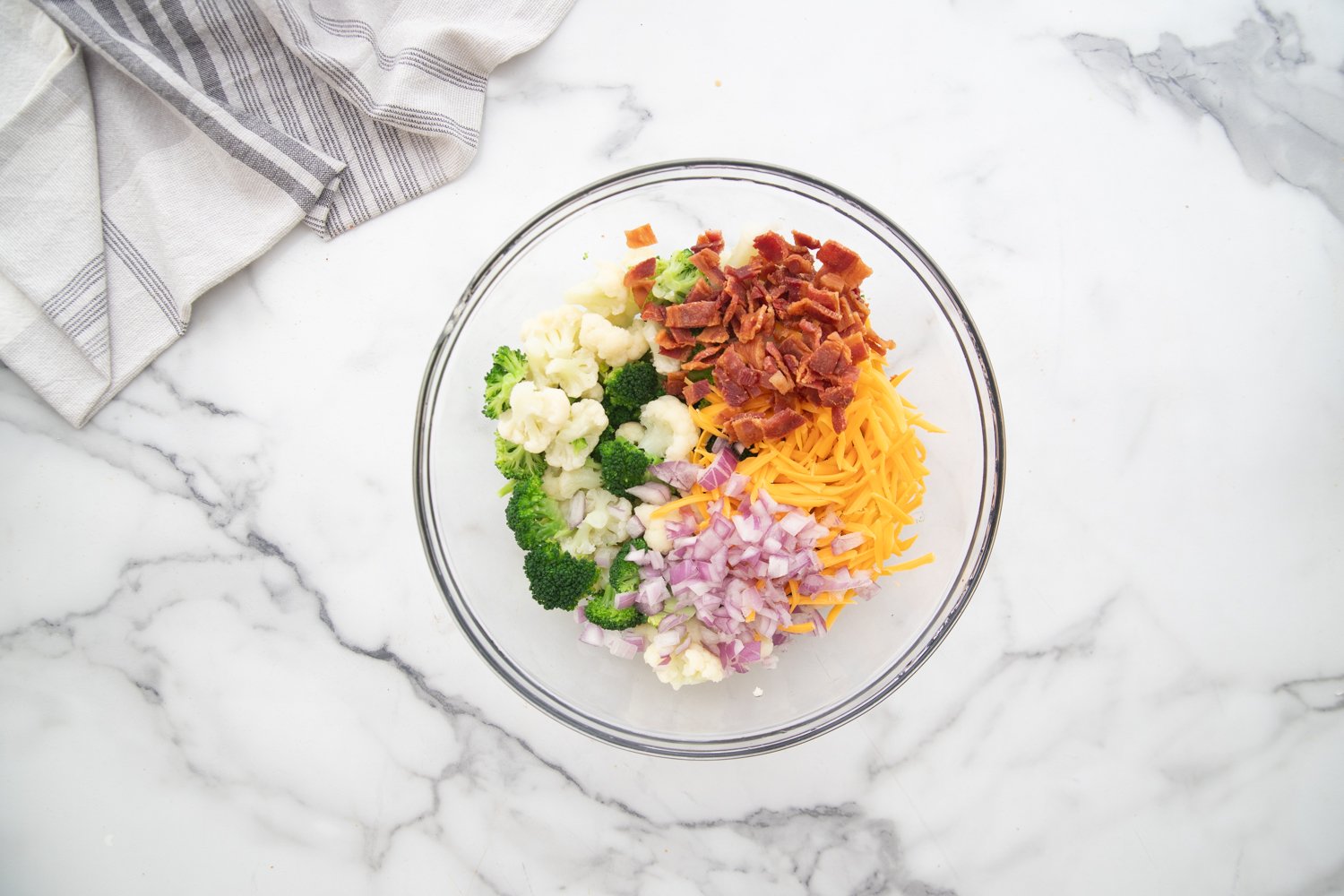 Amish Broccoli Salad ingredients in a bowl