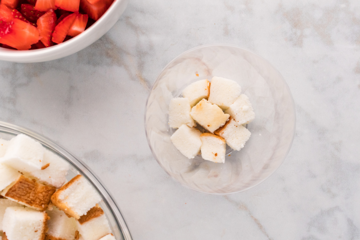 cake cubes in a plastic cup