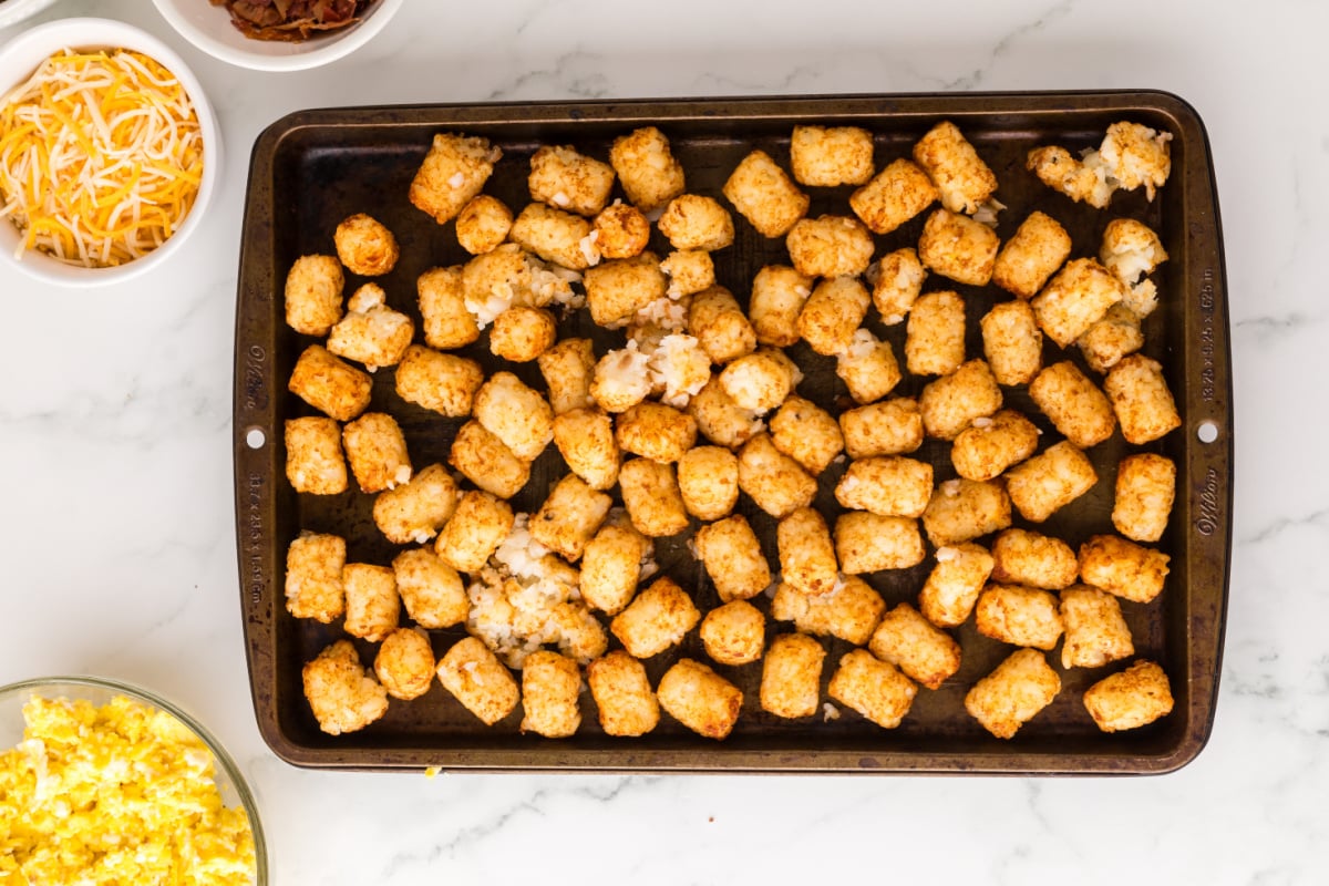 cooked tater tots on a pan