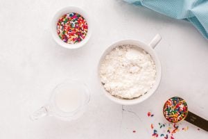 ingredients being mixed in a mug