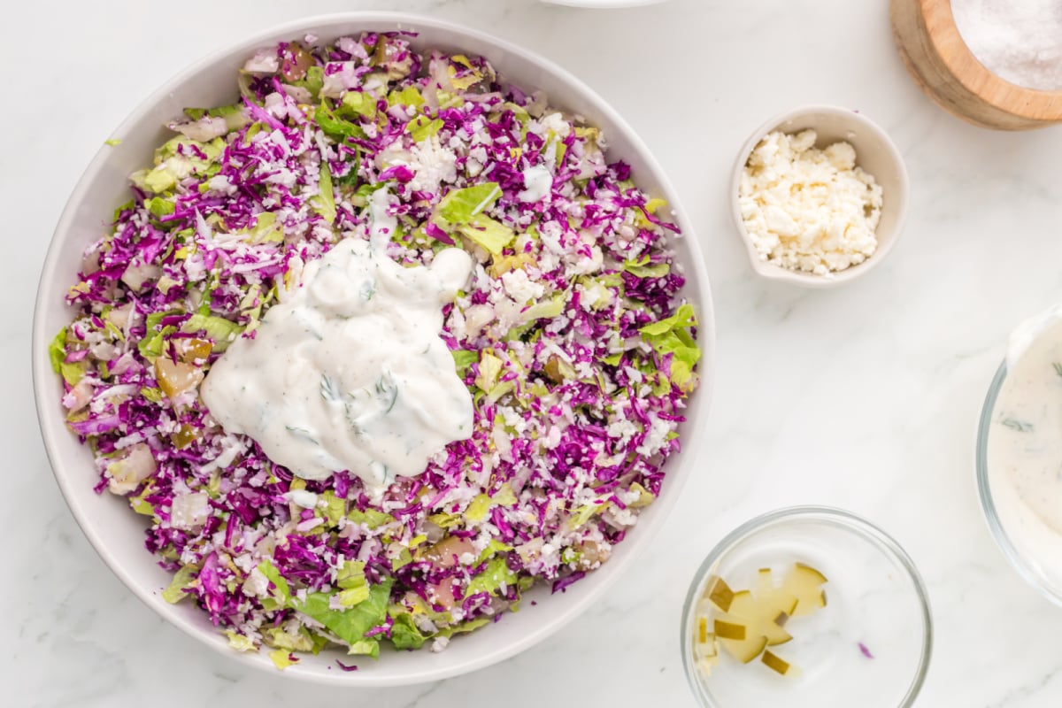 dressing added to the top of she salad