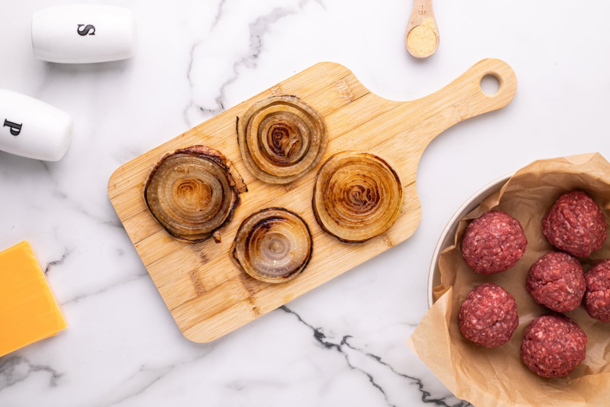cooked onions on a cutting board