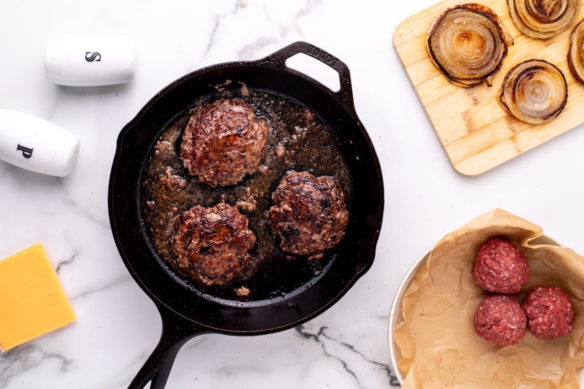 cooked hamburgers in pan