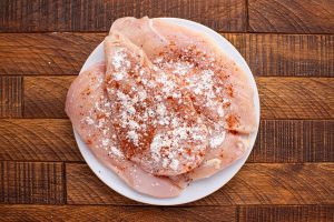 seasoning added to chicken