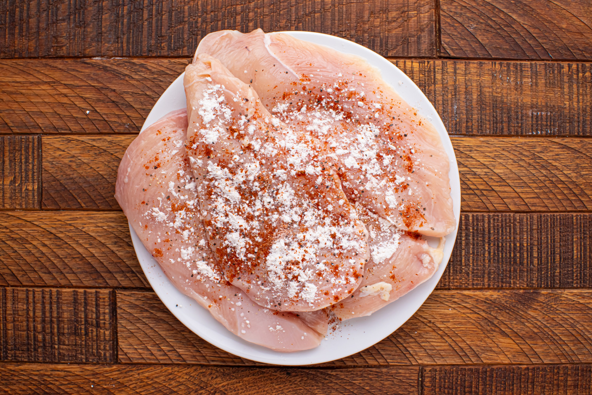 seasoning added to chicken