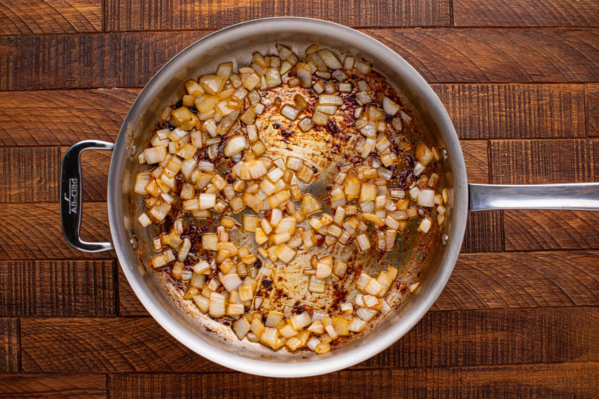 oil and onions cooking in pan