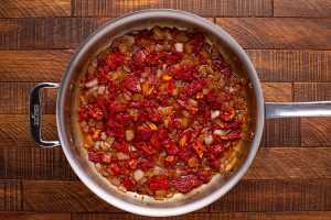 cajun seasoning added to pan