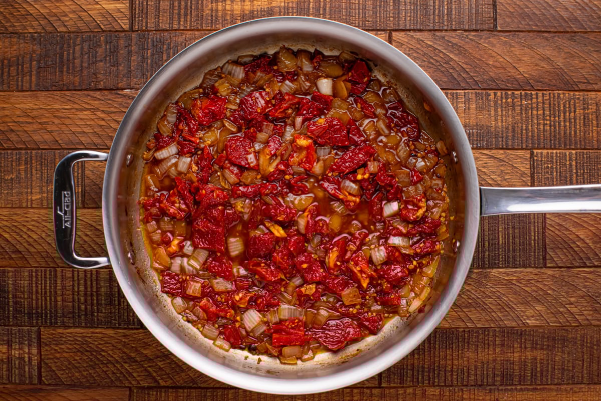 cajun seasoning added to pan