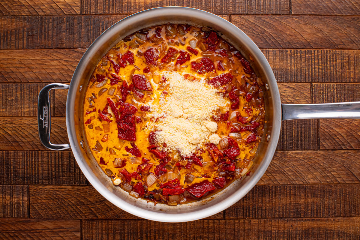cream, parmesan cheese and lime juice added to pan
