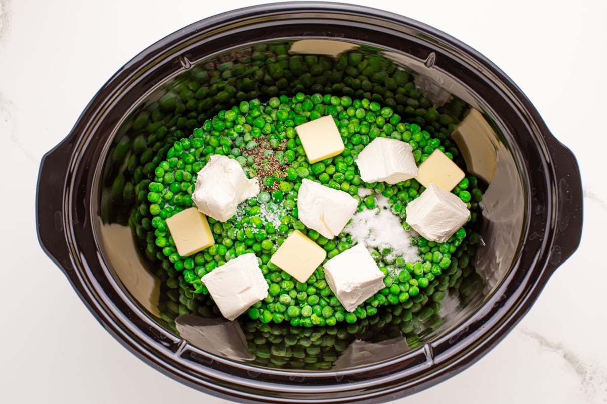 cream cheese, sliced butter, heavy cream, sugar, salt, and pepper added to peas