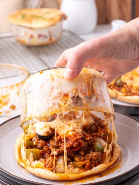 Upside Down Pizza Pot Pie being put on a plate