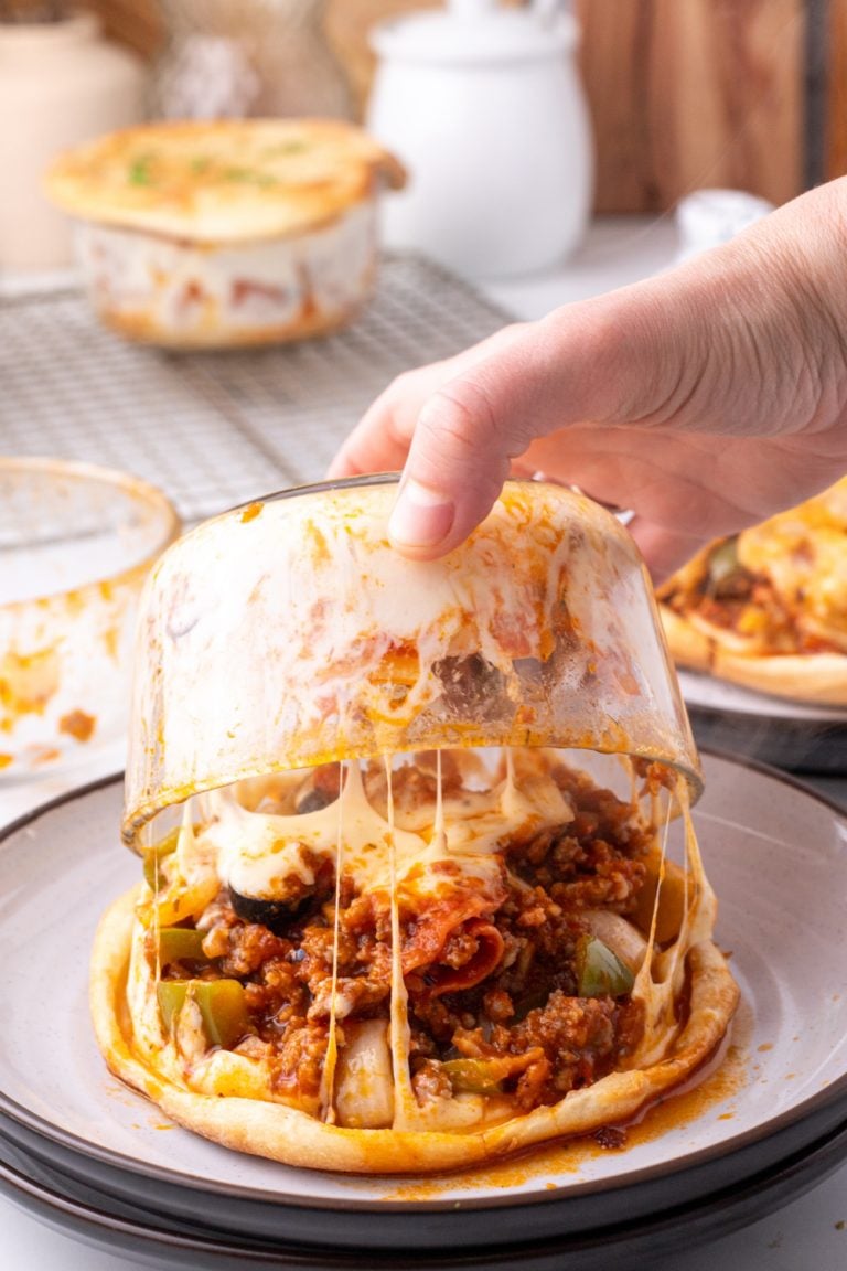 Upside Down Pizza Pot Pie being put on a plate