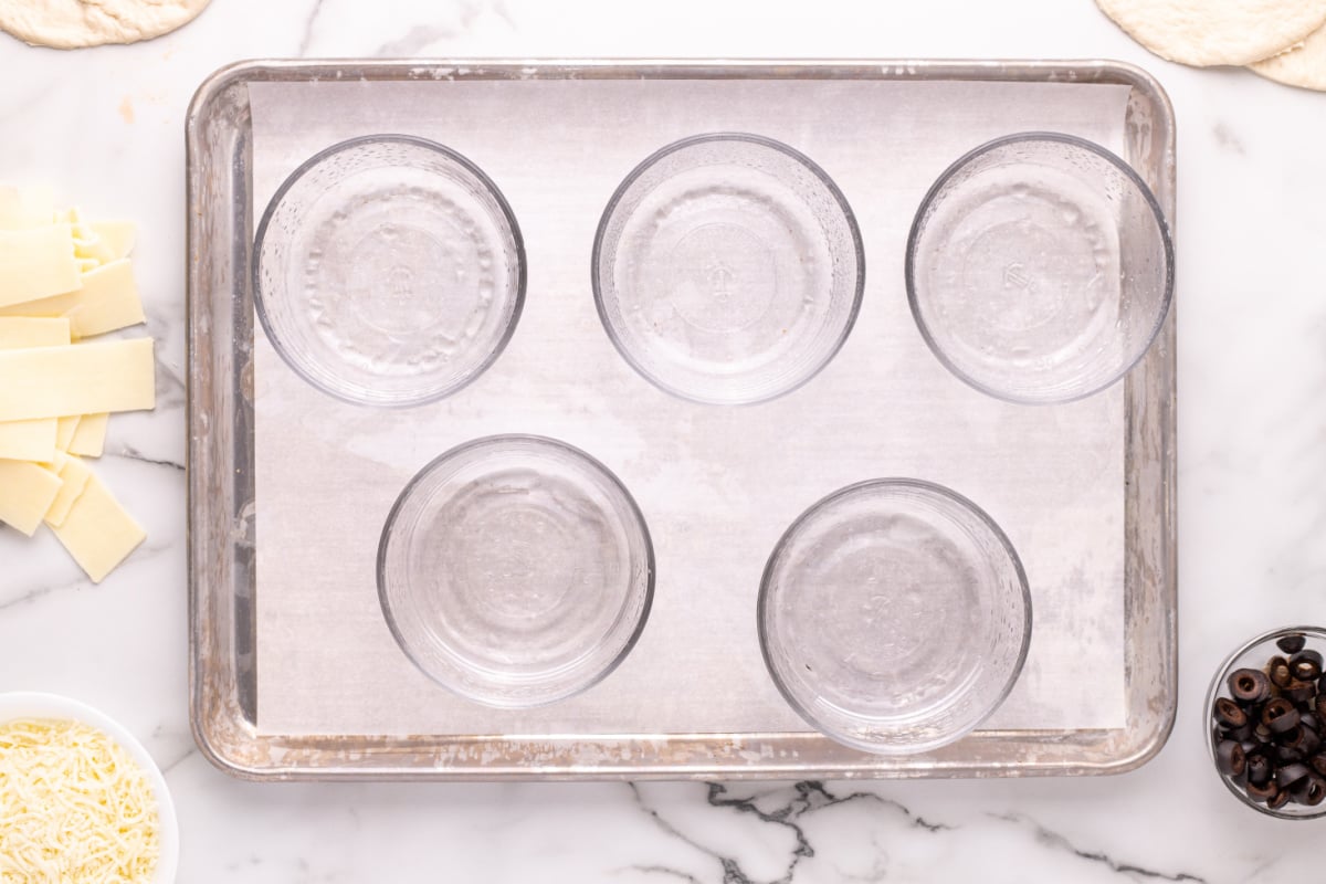 small glass bowls on a baking dish