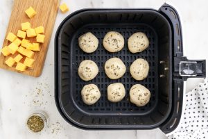 Air Fryer Ham and Cheese Biscuit Bombs in air fryer