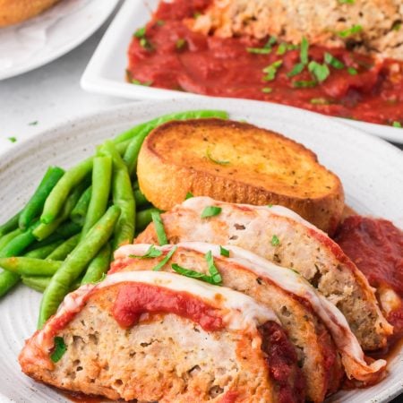 Chicken Parmesan Meatloaf sliced on a plate