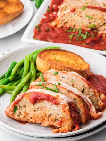 Chicken Parmesan Meatloaf sliced on a plate