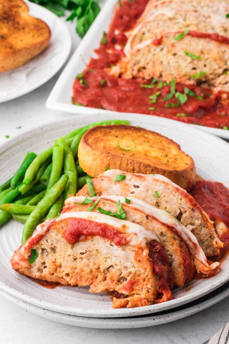 Chicken Parmesan Meatloaf sliced on a plate