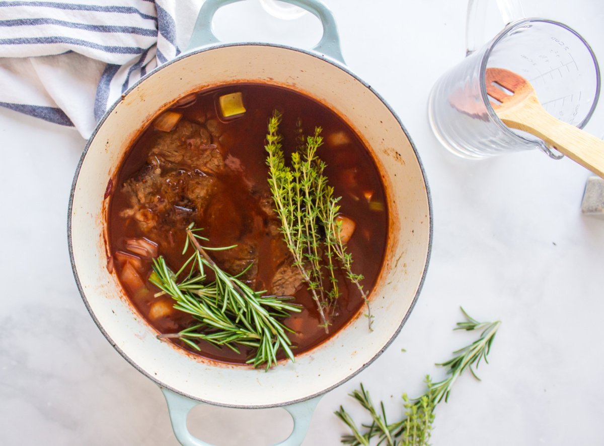 beef broth, thyme sprigs, rosemary sprigs, worcestershire sauce,bay leaves, and your seared roast placed in the pot
