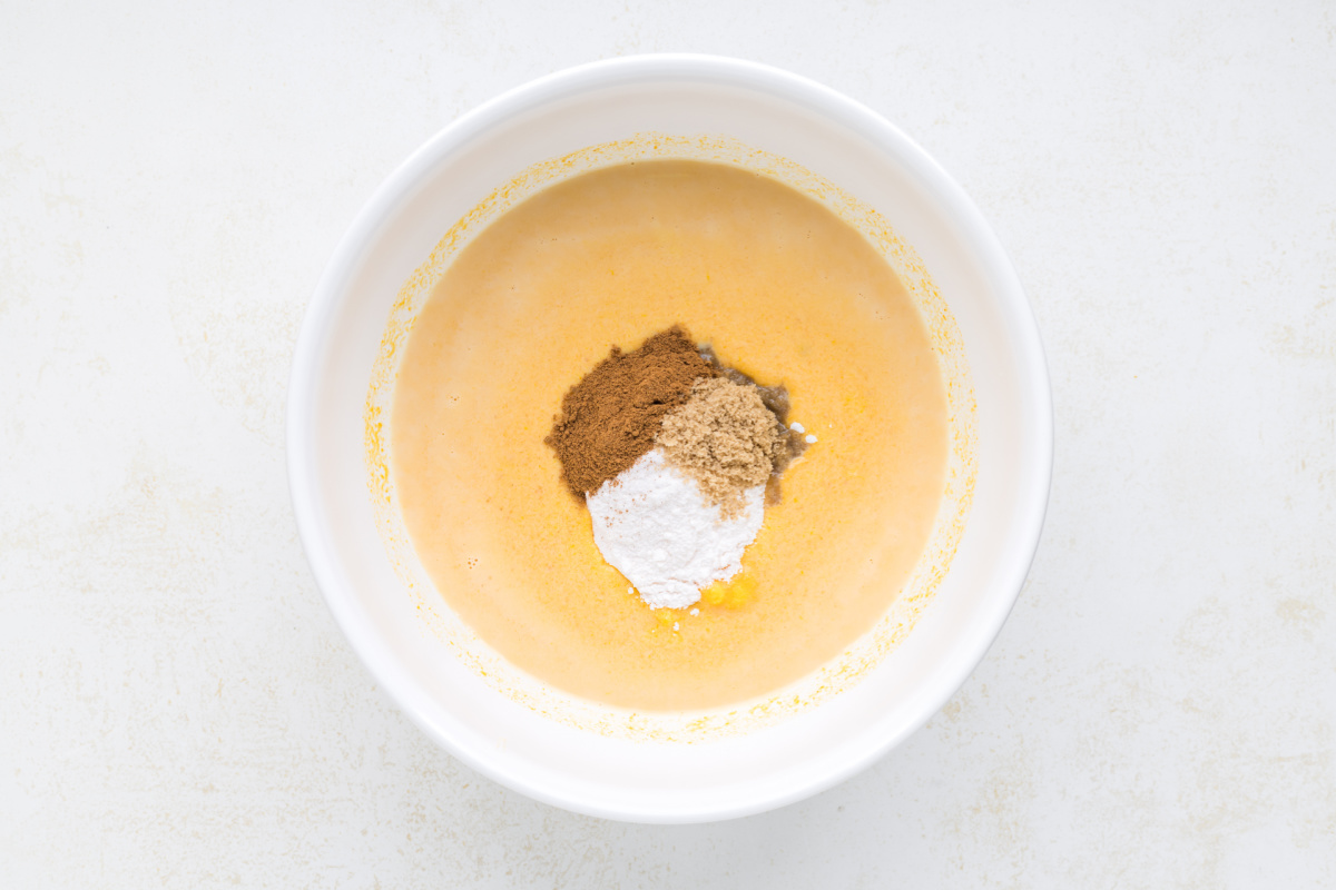 spices and pudding mix added to bowl