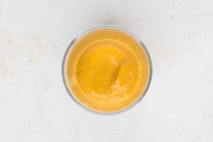 pumpkin pudding added to cup