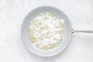 flour added to pan with onions