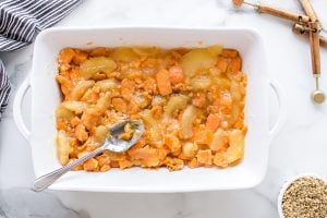 yams and apple pie filling in baking dish