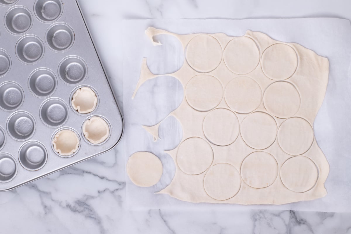 cutting circles out of dough