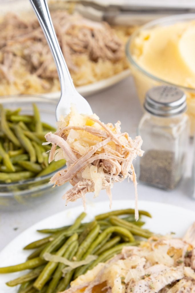 fork pick up some Classic Pork Loin and Sauerkraut