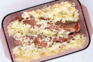 sauerkraut added to baking dish