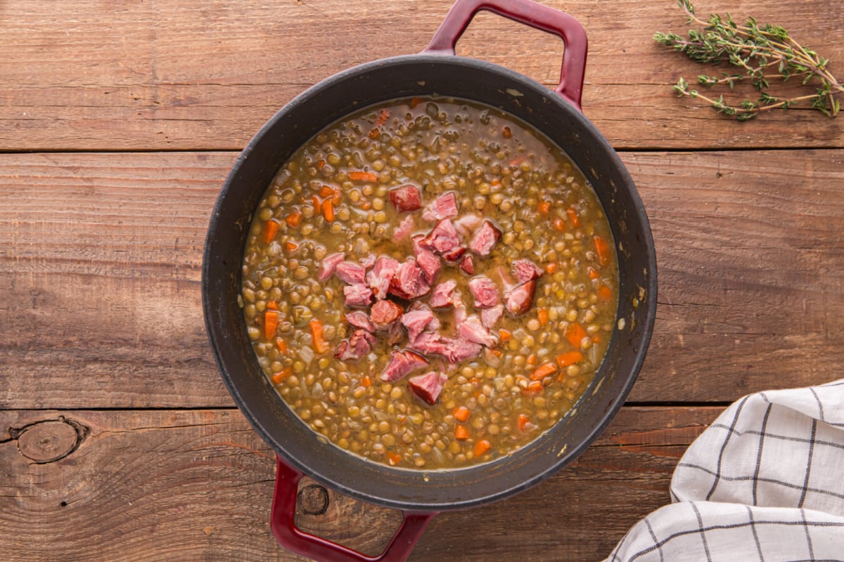 ham pieces added to the soup pop