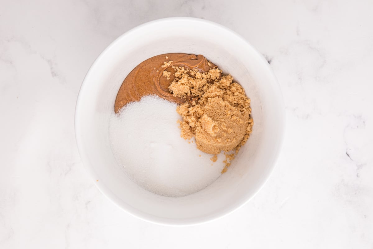 almond butter, granulated sugar, and brown sugar in a mixing bowl