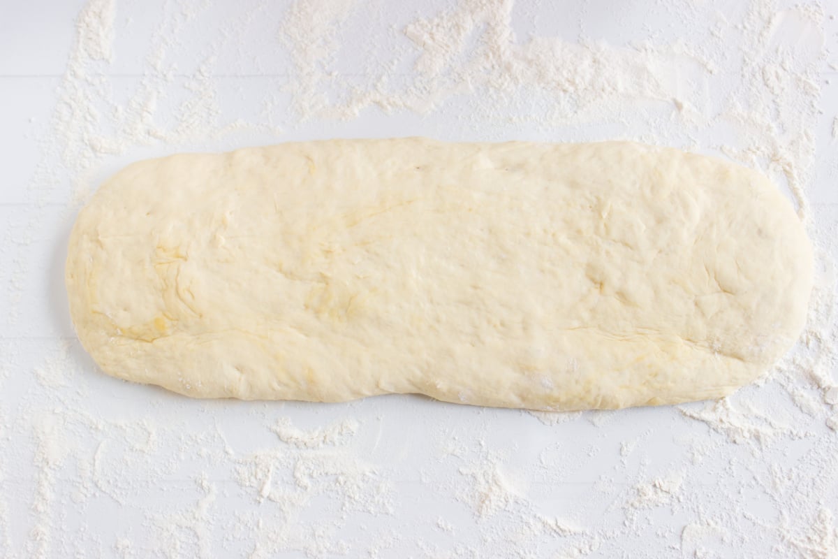 dough laid out on floured surface