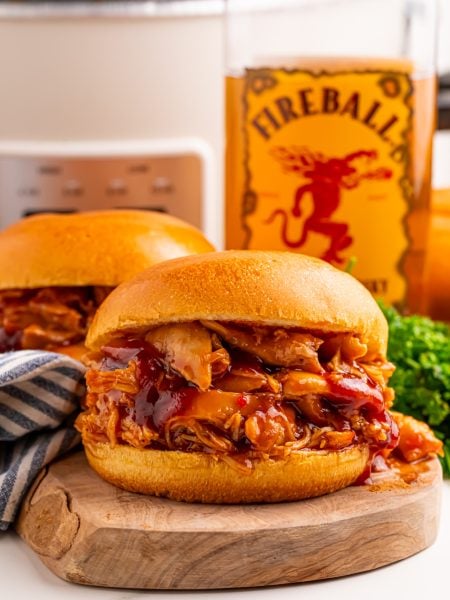 Slow Cooker Fireball BBQ Pulled Chicken sandwich on a plate