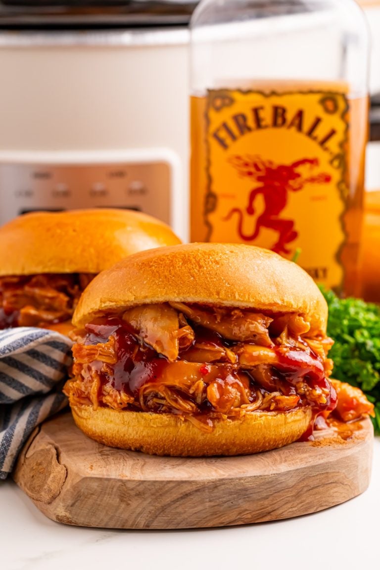 Slow Cooker Fireball BBQ Pulled Chicken sandwich on a plate