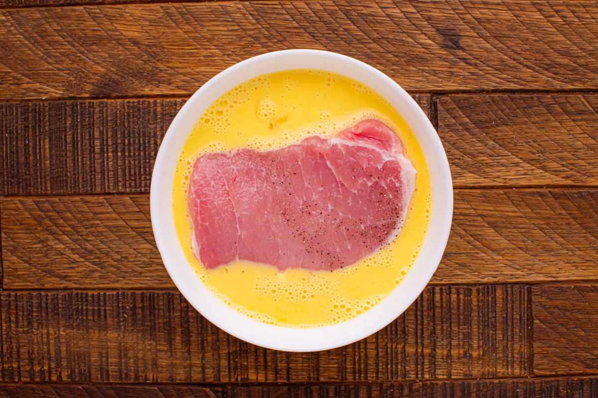 pork chop in egg mixture
