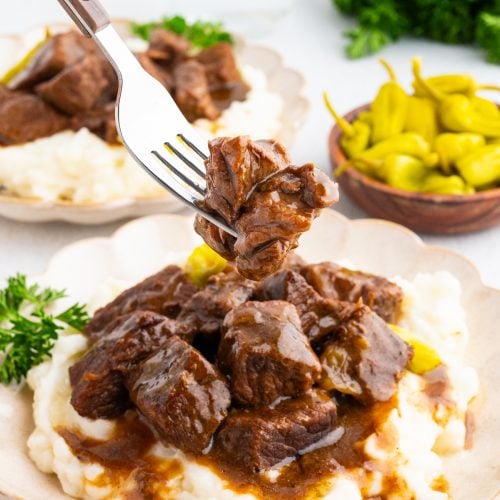 slow cooker mississippi steak bites on a plate