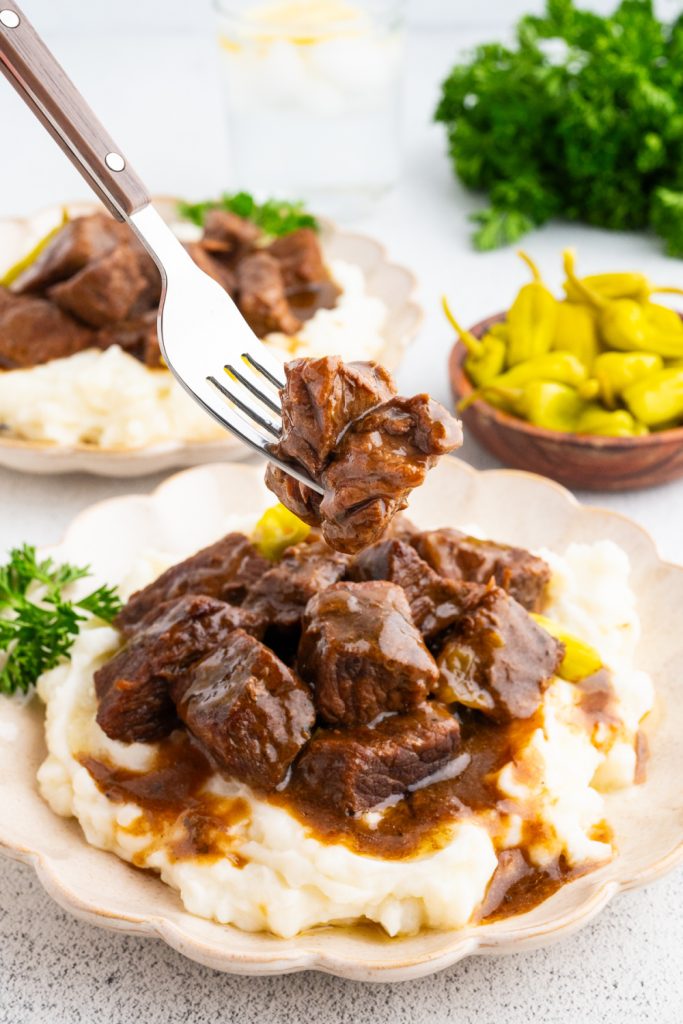 slow cooker mississippi steak bites on a plate