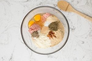 ingredients for meatballs in a bowl