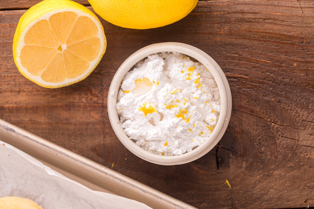 powdered sugar and lemon zest in a bowl