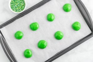 cookie balls put on a cookie sheet