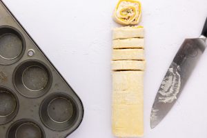 cutting sliced of puff pastry roll