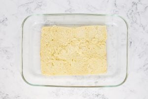 bottom half of rolls in baking dish