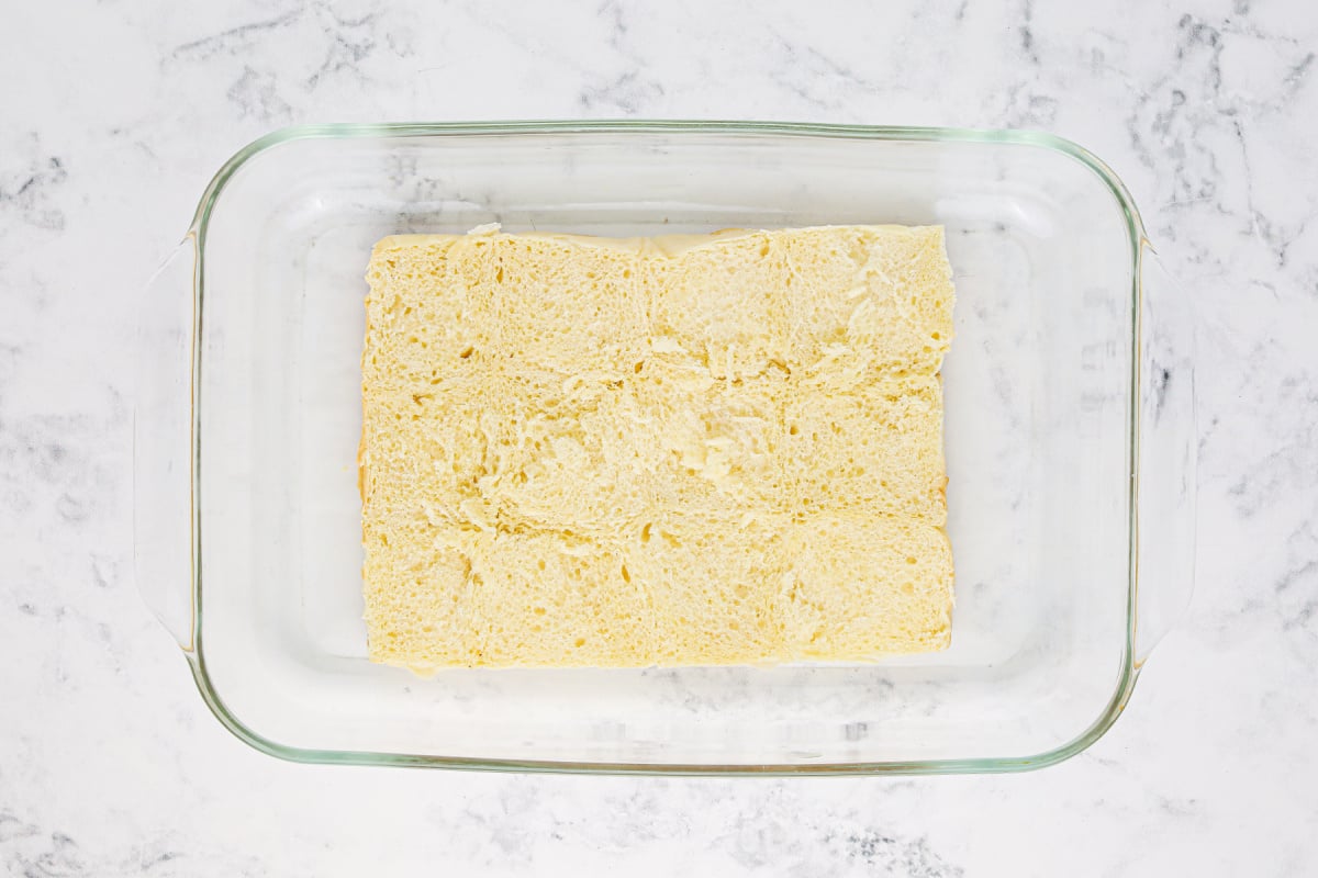 bottom half of rolls in baking dish