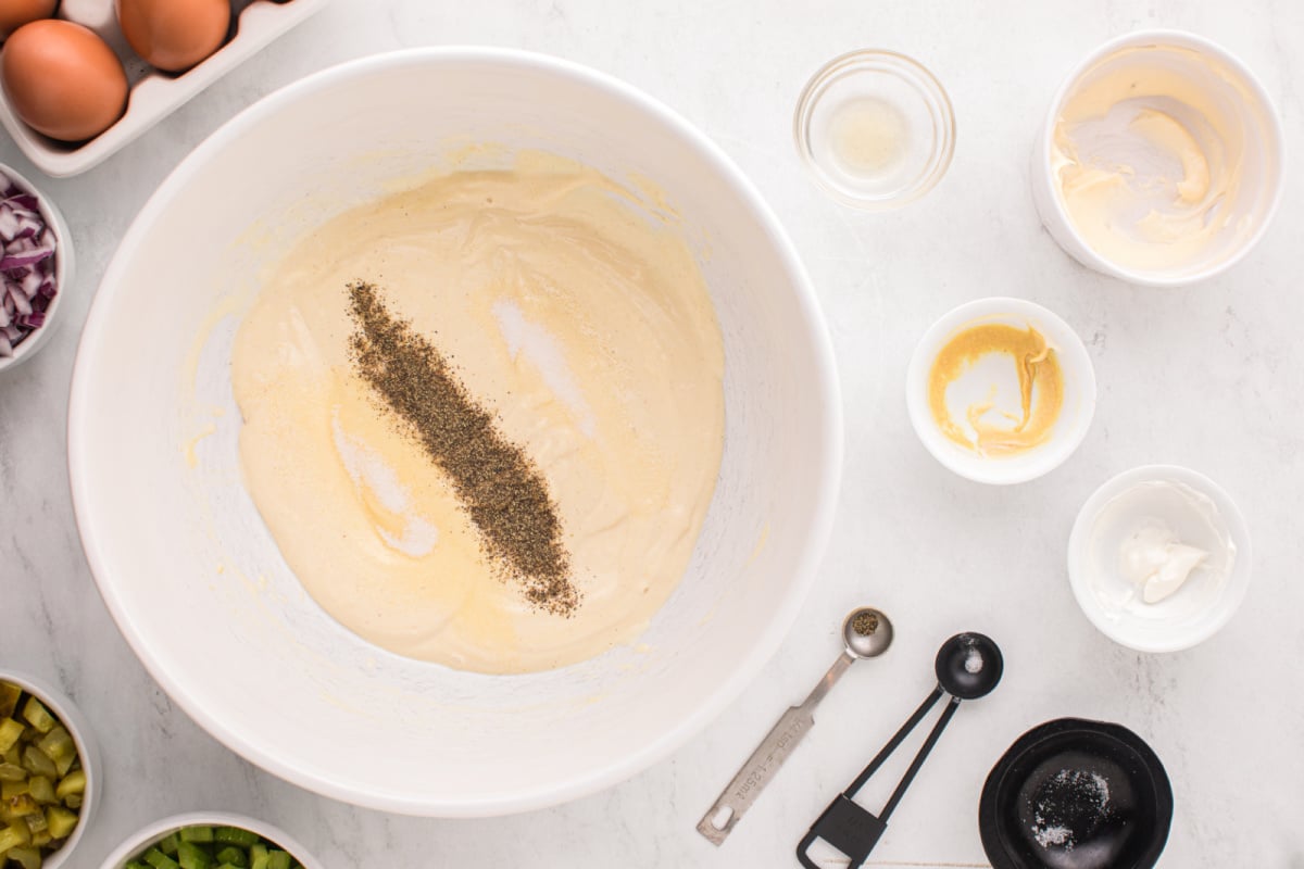  mayonnaise, honey mustard, apple cider vinegar, and sour cream, sugar, salt and pepper in a medium bowl