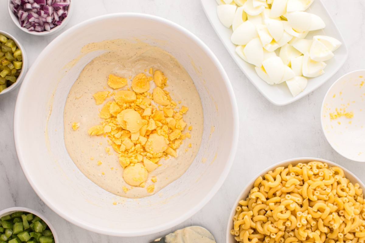chopped egg yolks added to the bowl