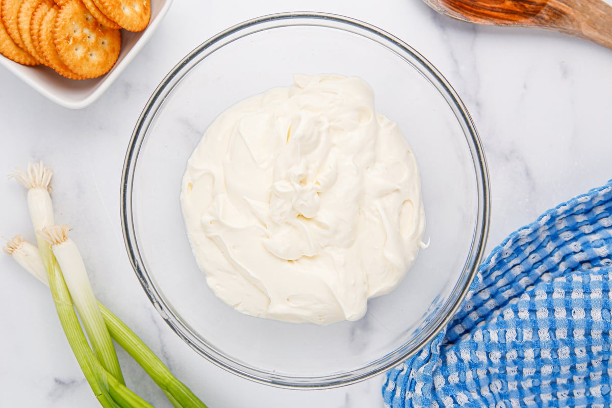 cream cheese, sour cream and mayonnaise in a bowl