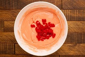 chopped cherries added to the cake batter