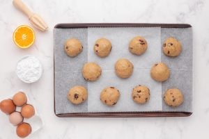 dough rolled into balls and placed on baking sheet