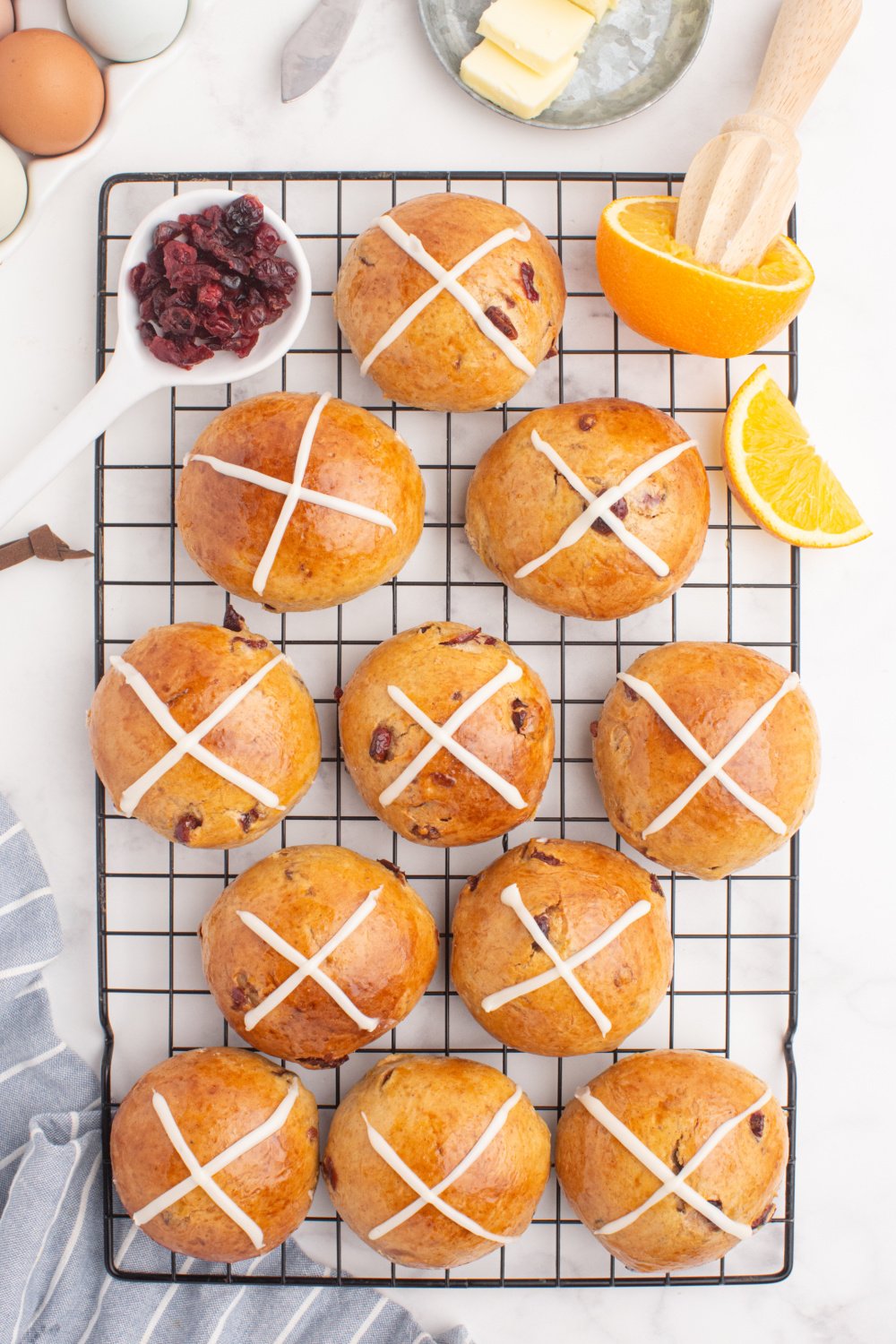 hot cross buns on cooling rack